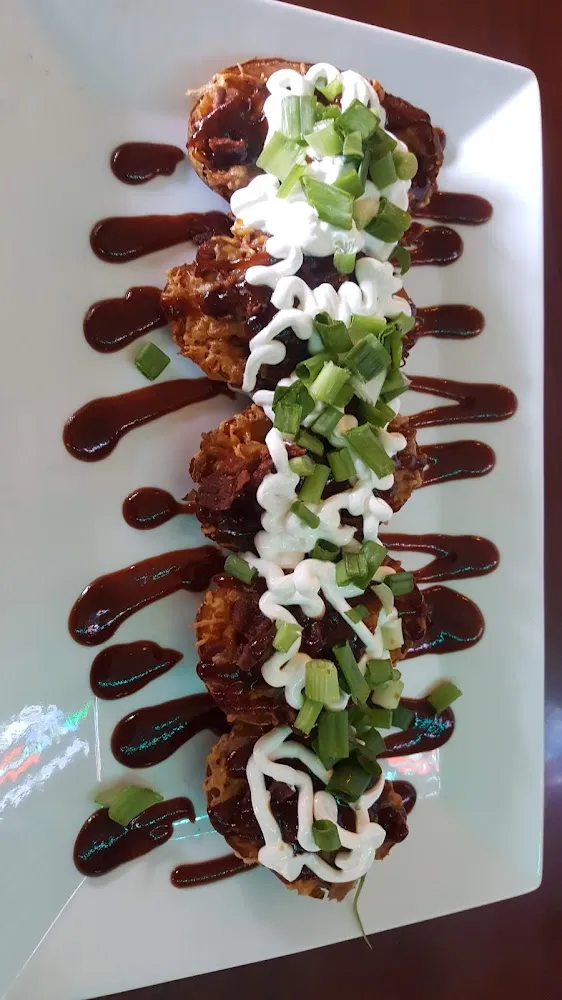 Potato Skins with Cheddar Bacon and Green Onions